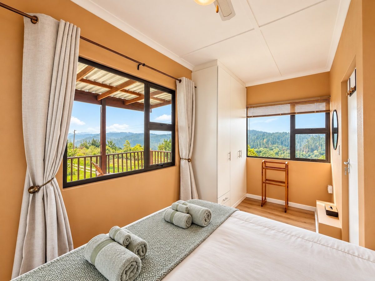 Bedroom window with a view of the hills