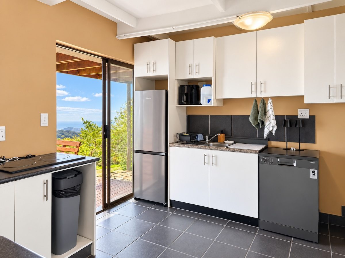 Kitchen with fridge and dishwasher
