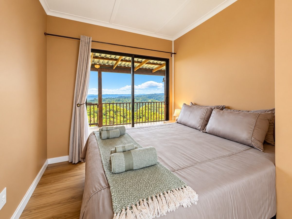 Bedroom with a double bed and a view